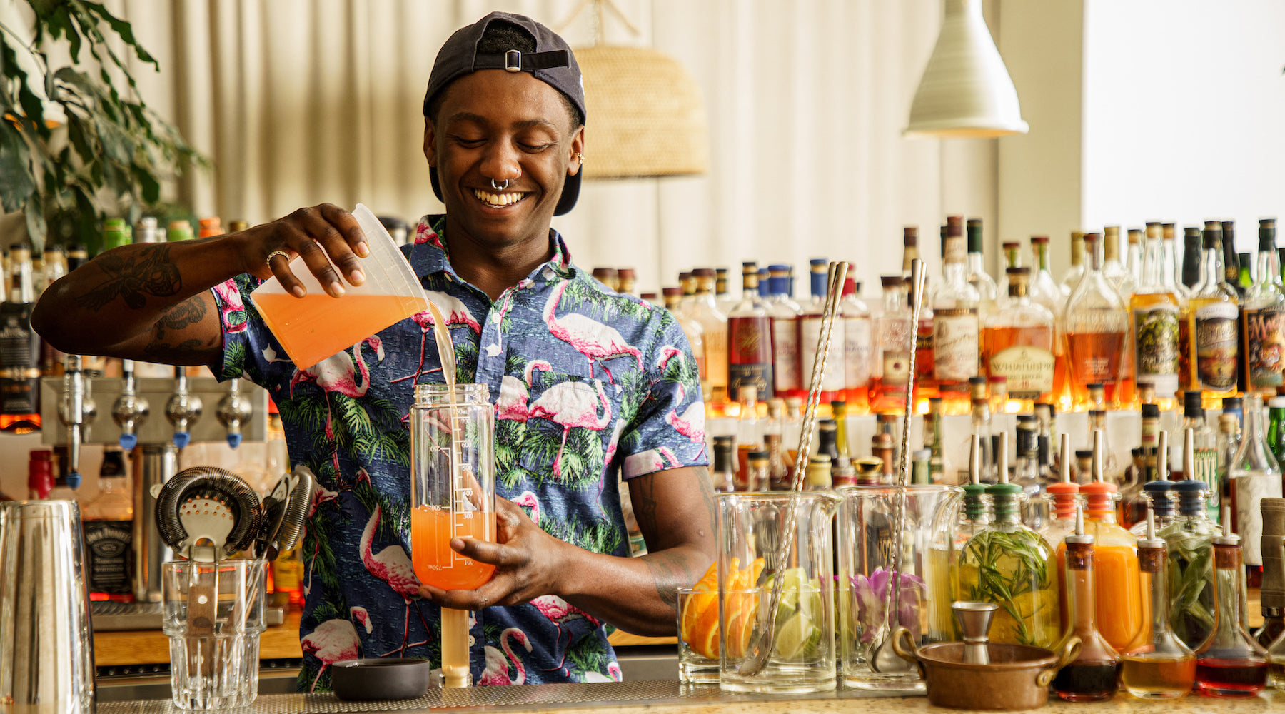 Bartender using innovative bar supplies in a craft bar