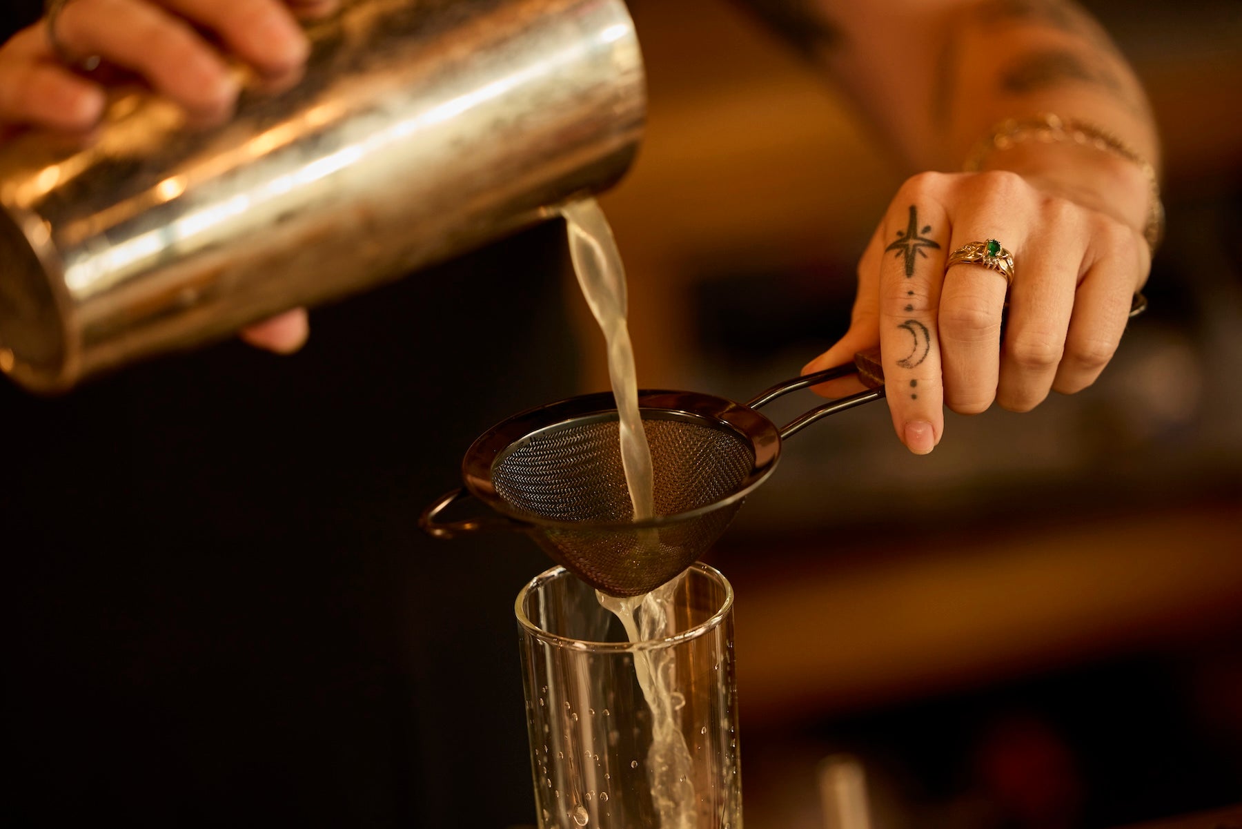 Fine mesh strainer in a craft cocktail bar