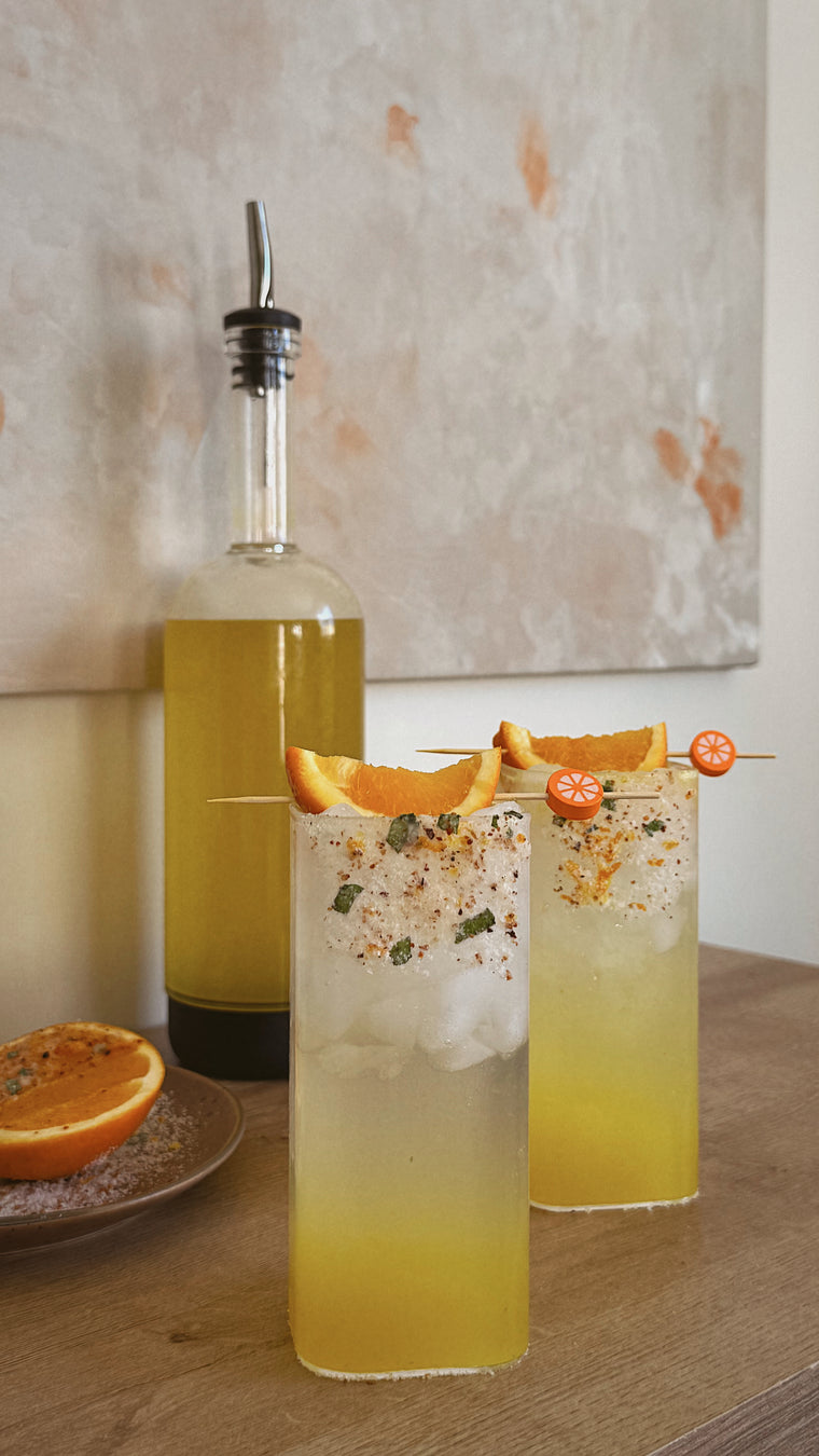 Summery orange flavored limoncello drink with Crew Bottle infusion | Crew cocktail kits