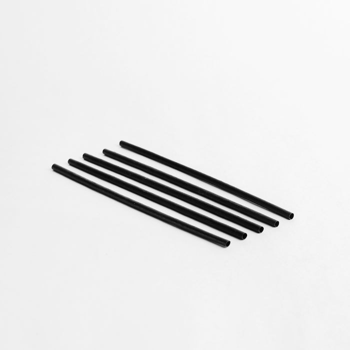 Black agave cocktail straws laying flat