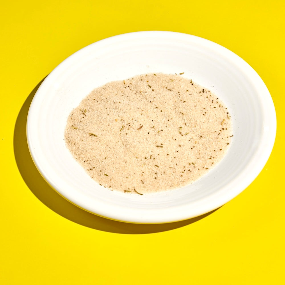 Bloody Mary cocktail rimming salt on a dish for glass rim