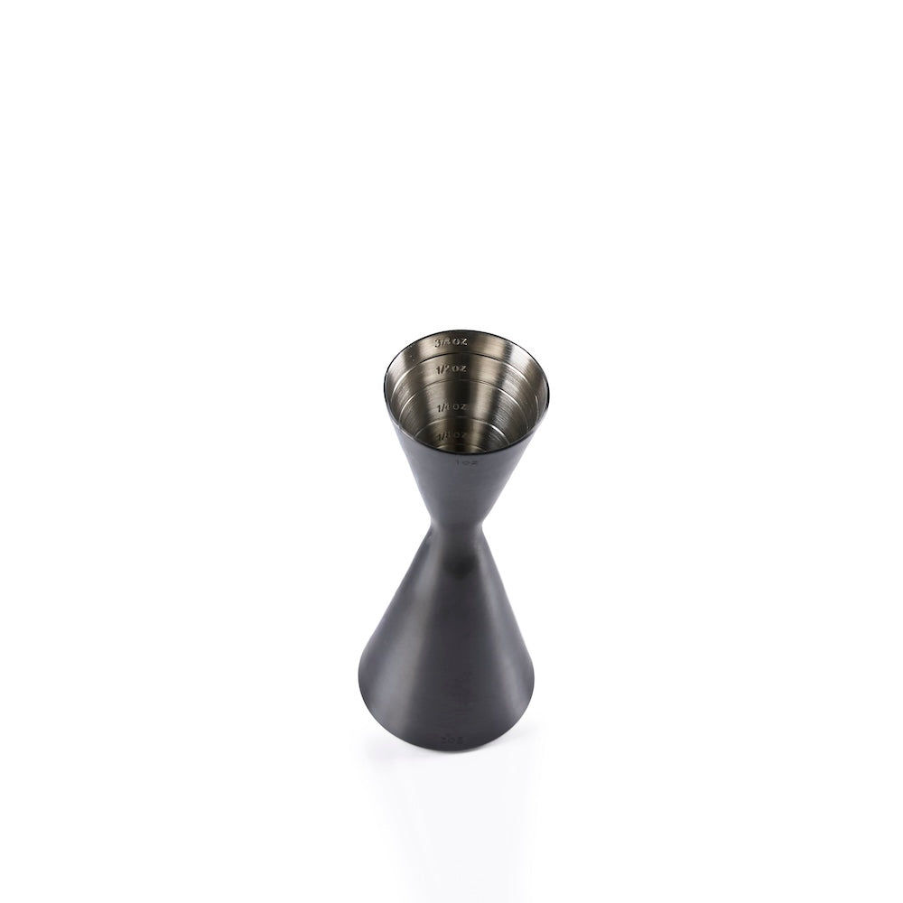 Black and silver cocktail jigger with measurement mark on a white background