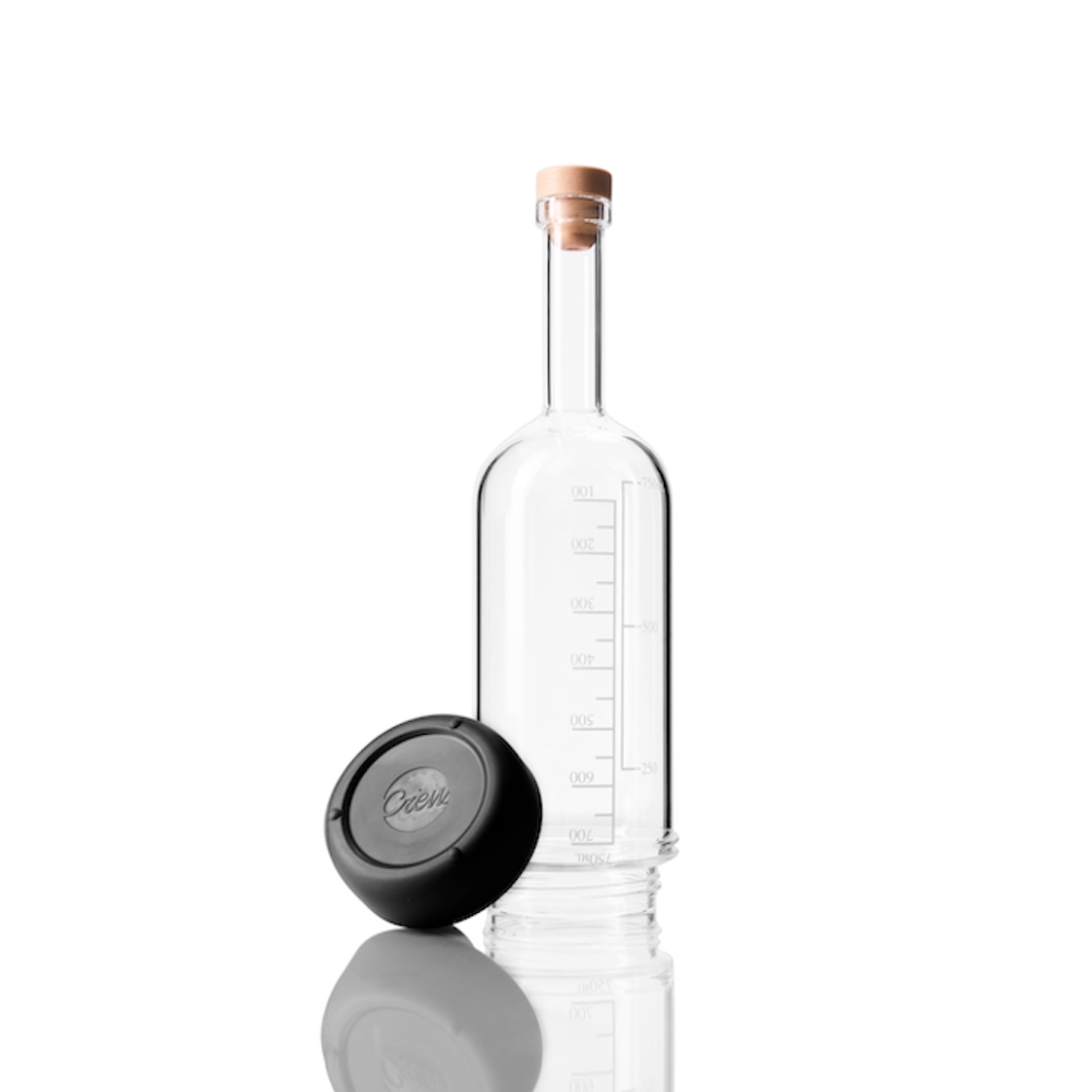 Glass Crew Bottle with measurement lines and a removable base Pepper color on white background