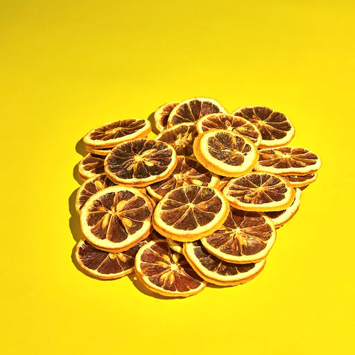 Dehydrated lemon slices for bulk cocktail garnishes.