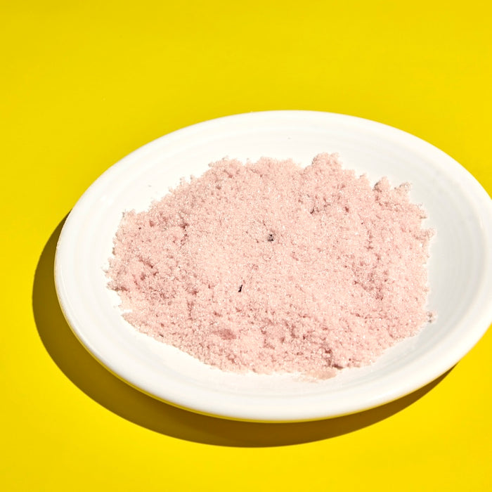 Hibiscus cocktail rimming sugar on a dish for glass rim